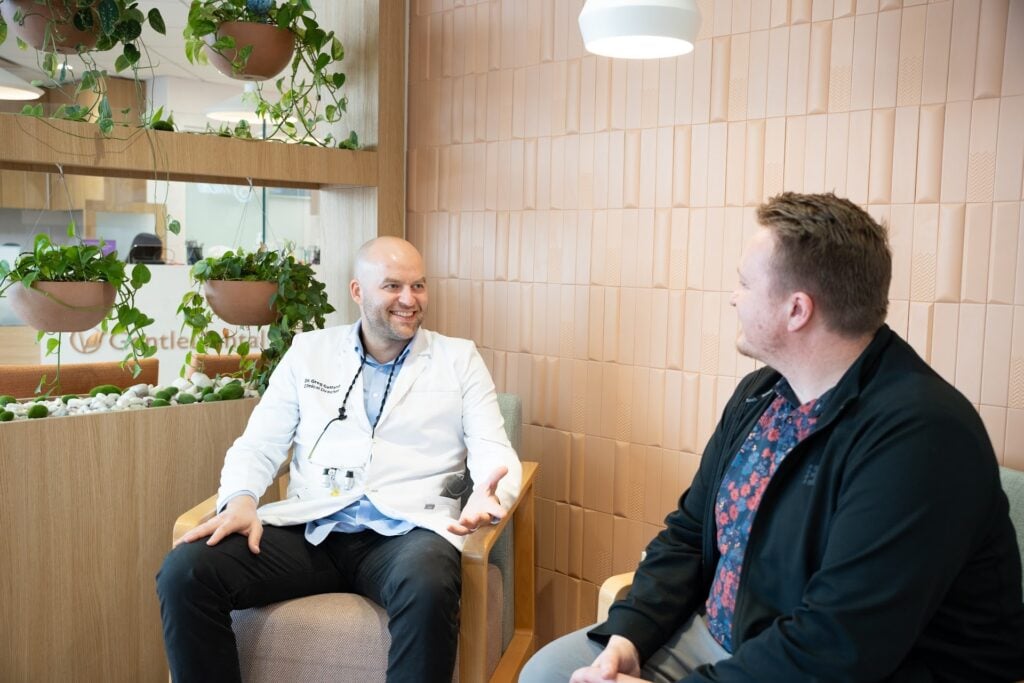 Dr. Greg Gelfand consulting with a patient